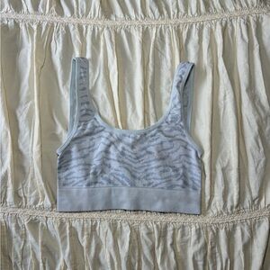 Light blue and grey zebra print sports bra 
Size small and xs